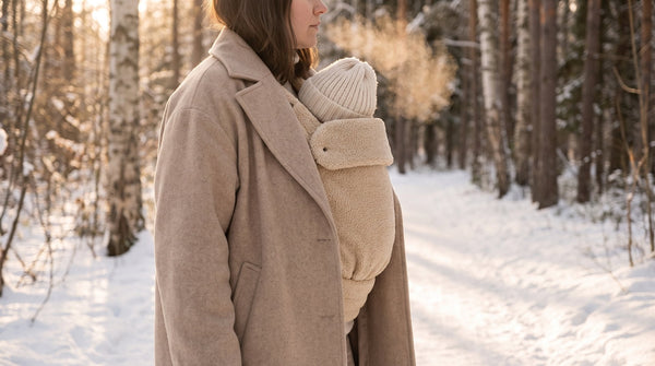 Dragen in de winter: zo houd je je baby warm in de draagzak